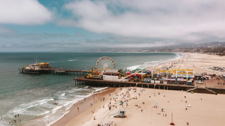 Top things to do in Santa Monica at sunset with pier, ocean views, and palm trees