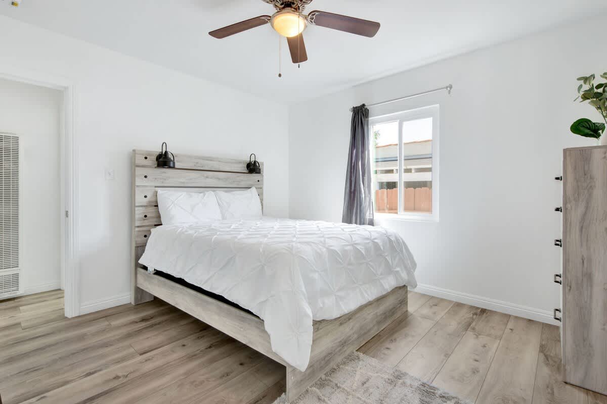 Bright and comfortable bedroom setup for a marina del rey family vacation rental featuring a cozy bed and natural lighting.